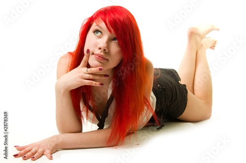 naughty girl lying looking at you photo