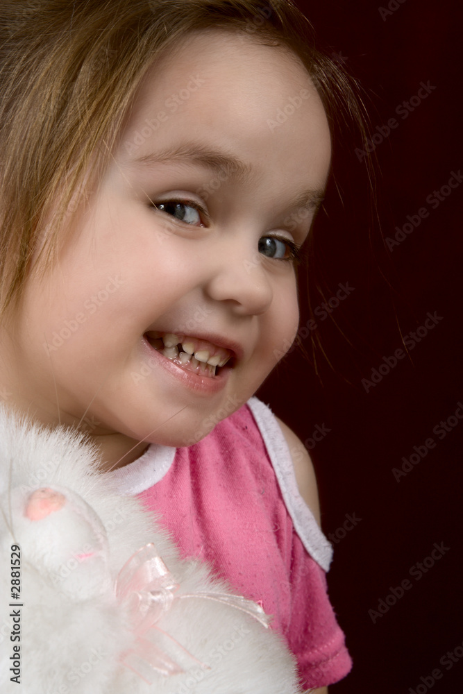 the small artful girl with a toy the small artful girl with a toy