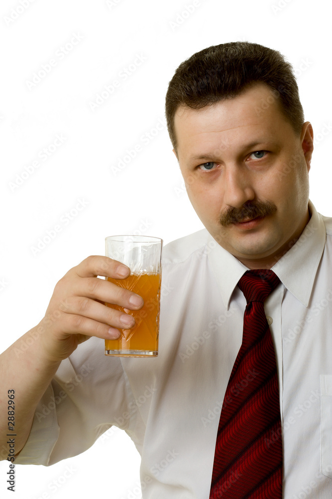 the young man drinking juice on a white background
