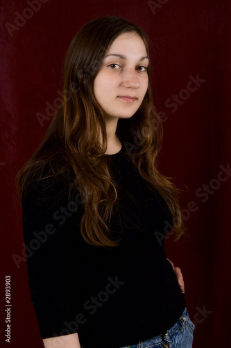 portrait of the young sexual girl on a dark background