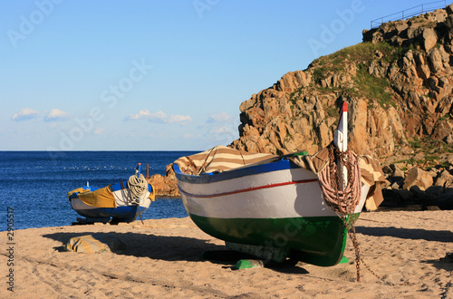 old fishing boats on the beach