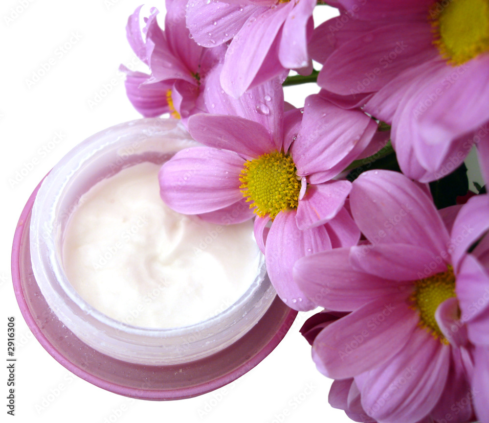 violet container of cosmetic moisturizing cream with flowers violet container of cosmetic moisturizing cream with flowers