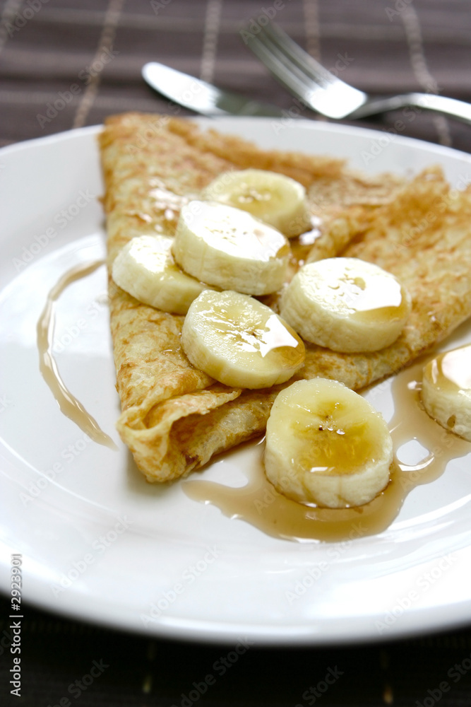 Delicious crepe with banana and honey
