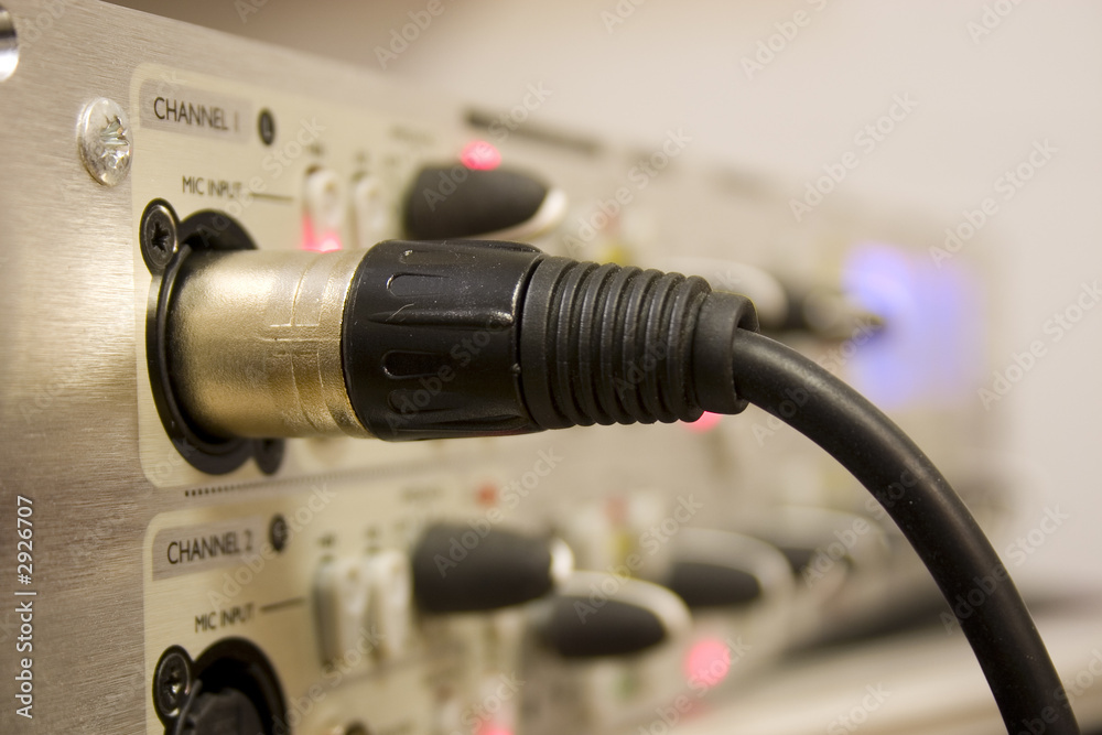 microphone lead plugged into equipment microphone lead plugged into equipment