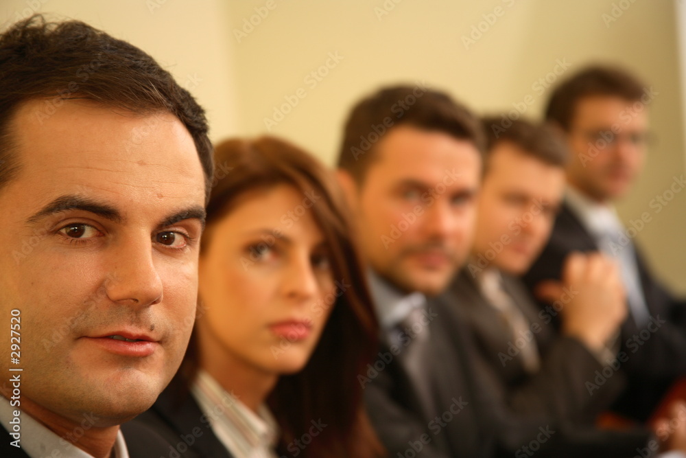 five business persons at a conference - portrait five business persons at a conference - portrait