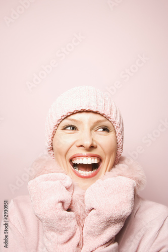 caucasian woman wearing winter coat and hat.