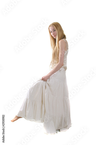 young girl in long withe dress