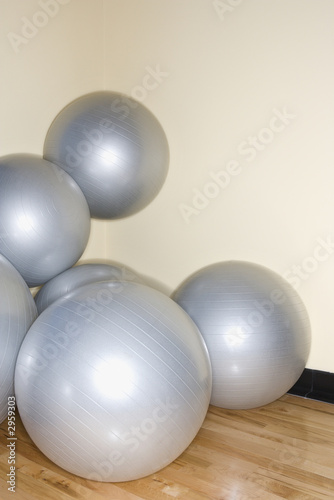 balance balls stacked in gym.