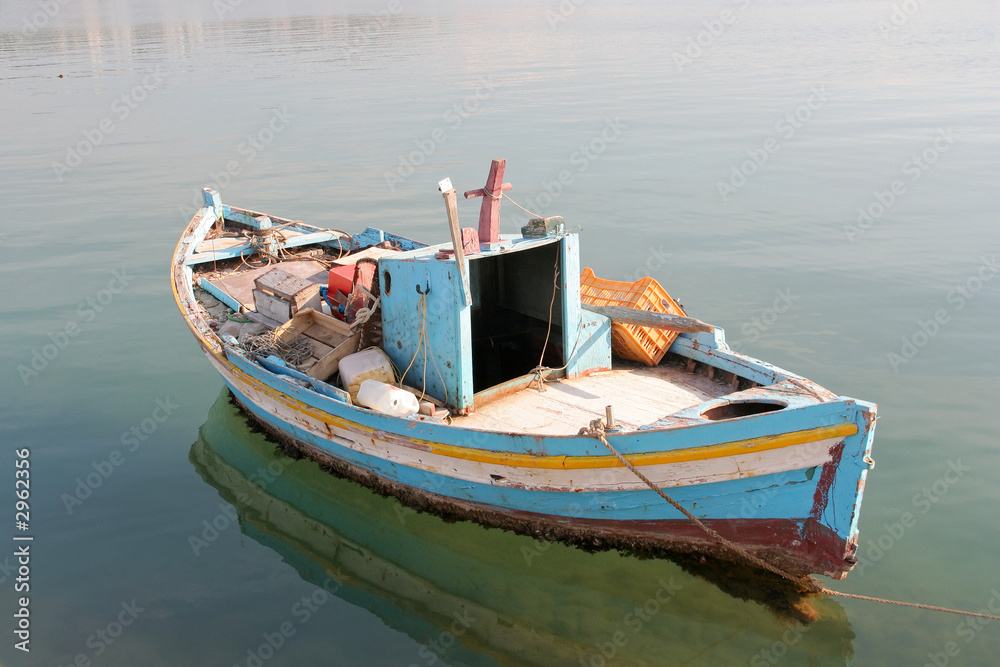 anchored little fishing boat