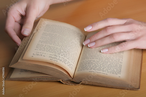 female hands with the book