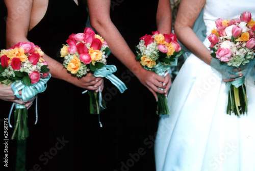 pink, yellow & red rose bouquet with bridesmaids