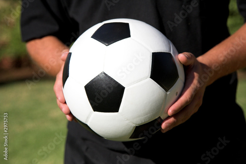 man holding soccer ball © jacojvr