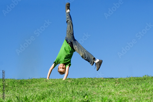 happy child playing, cartwheel