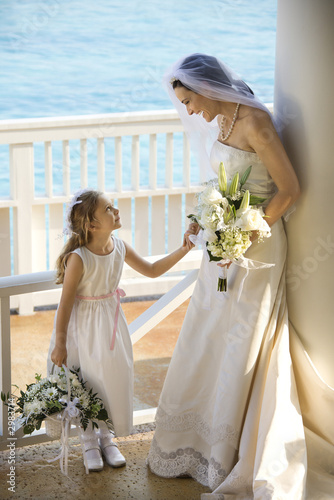 Bride and flowergirl. photo