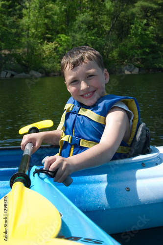 happy boy kayaking