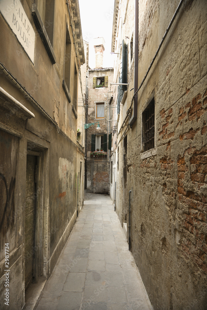 Alleyway between buildings in Venice, Italy.