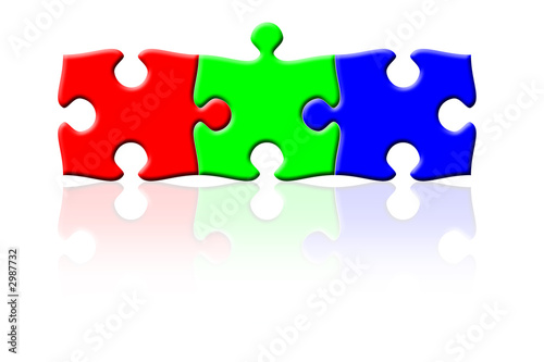 three puzzle pieces in rgb colors