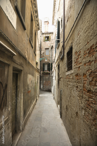 Alleyway between buildings in Venice  Italy.