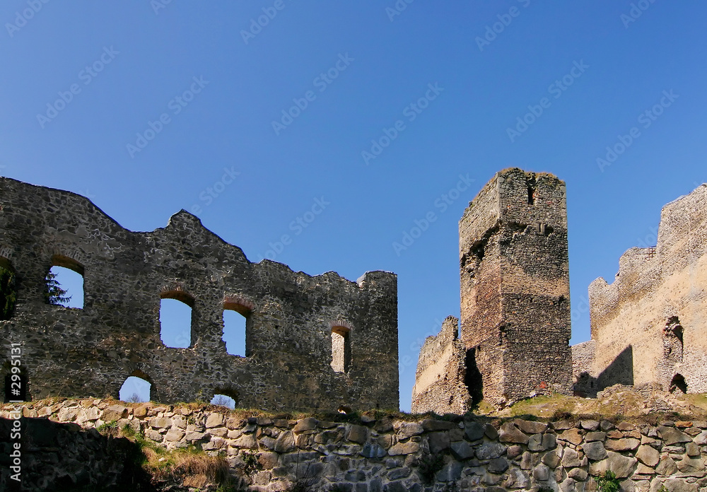 ruin of medieval castle and blue sky
