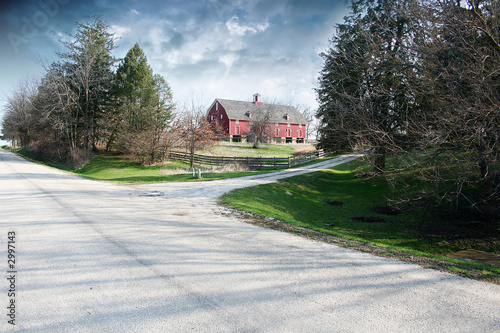  the old barn sits alone atop the hill