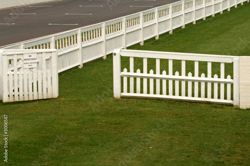 white fence at race track