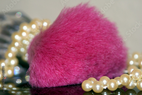 pink makeup brush with pearls