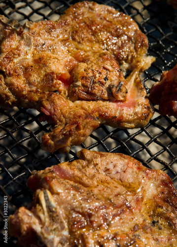 open air grilling steak.