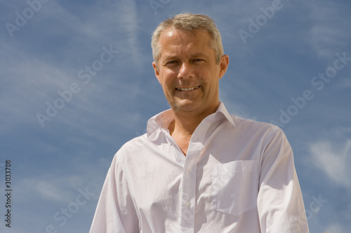 man and blue sky