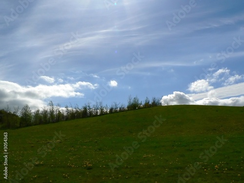 cloudy blue sky over meadow