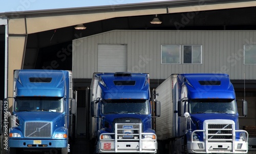 blue trucks at loading dock