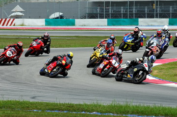 Fototapete Motorsport Rennräder an einer Rennstrecke  © Mayonaise