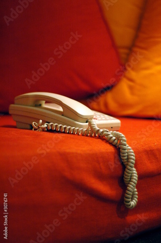 phone on orange bed