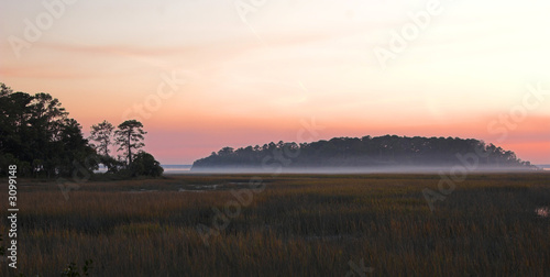coastal fog at sunset photo