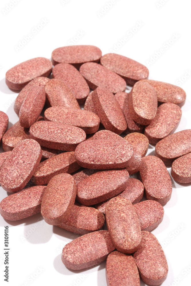 pile of red tablets pile of red tablets