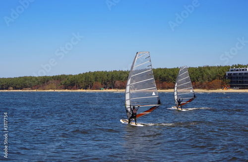 two windsurfers