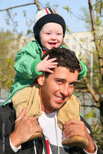 baby on father's shoulders 2 © Pavel Losevsky