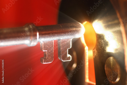 key & keyhole with light