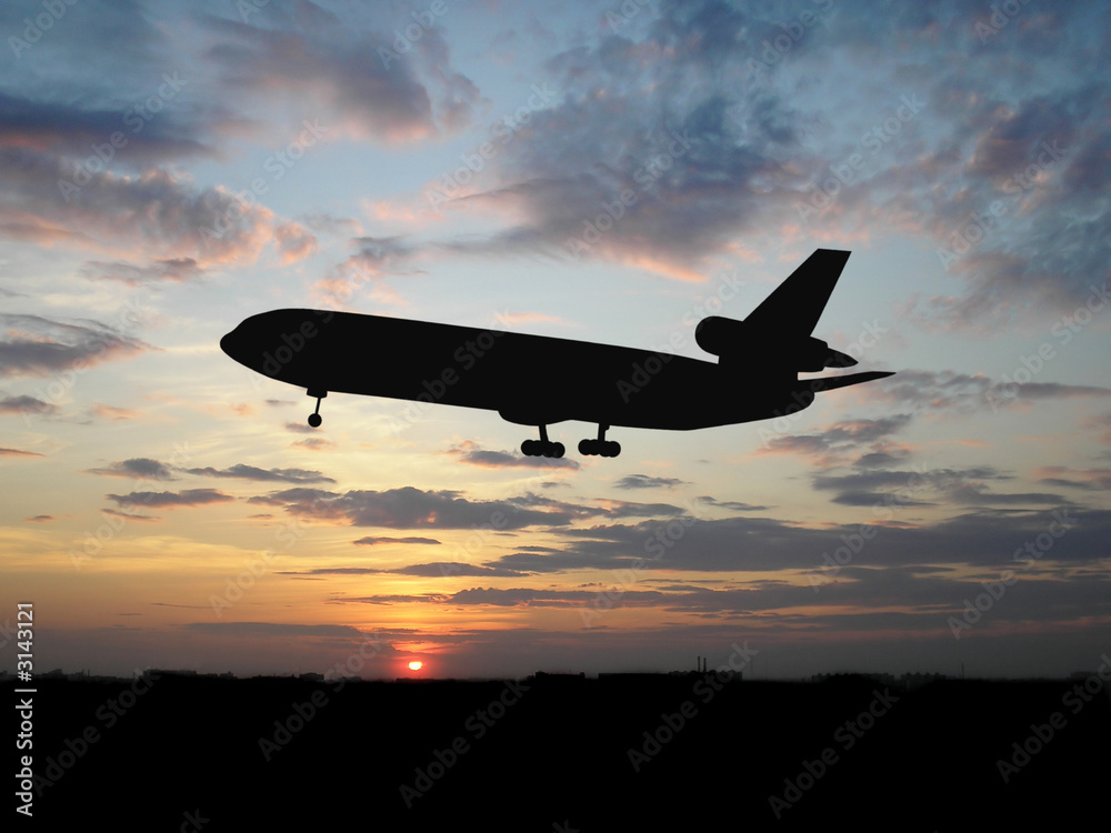 big plane over sunset