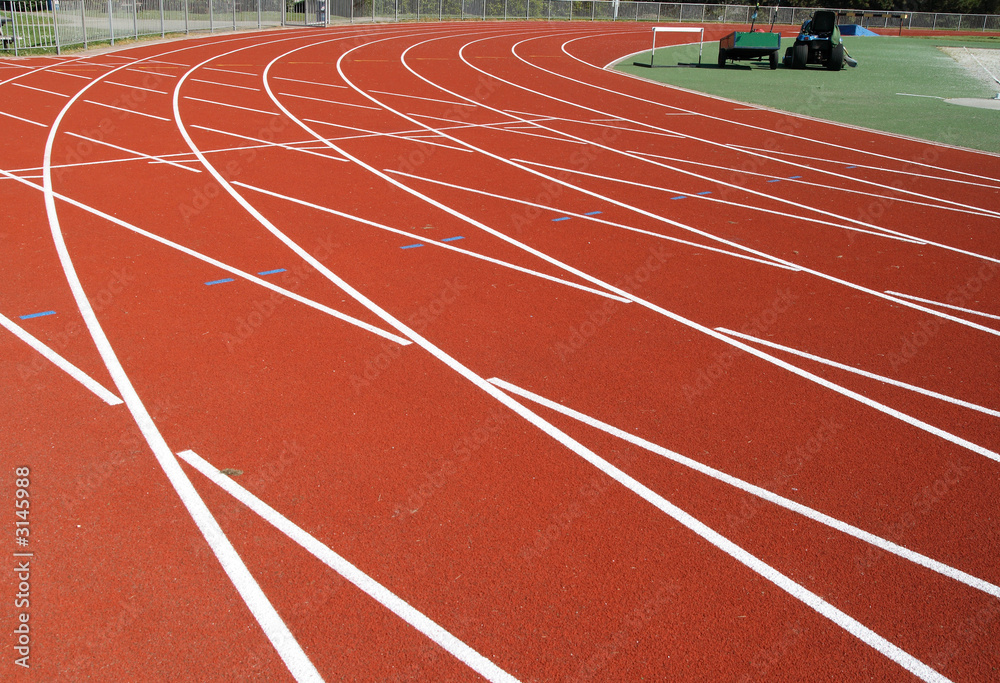 close up of the final bend on a running track.