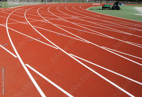 close up of the final bend on a running track.