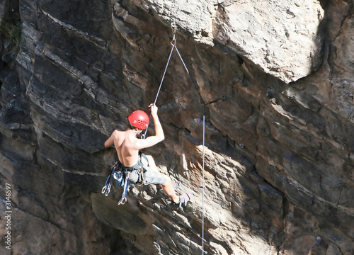 rock climber dangling photo