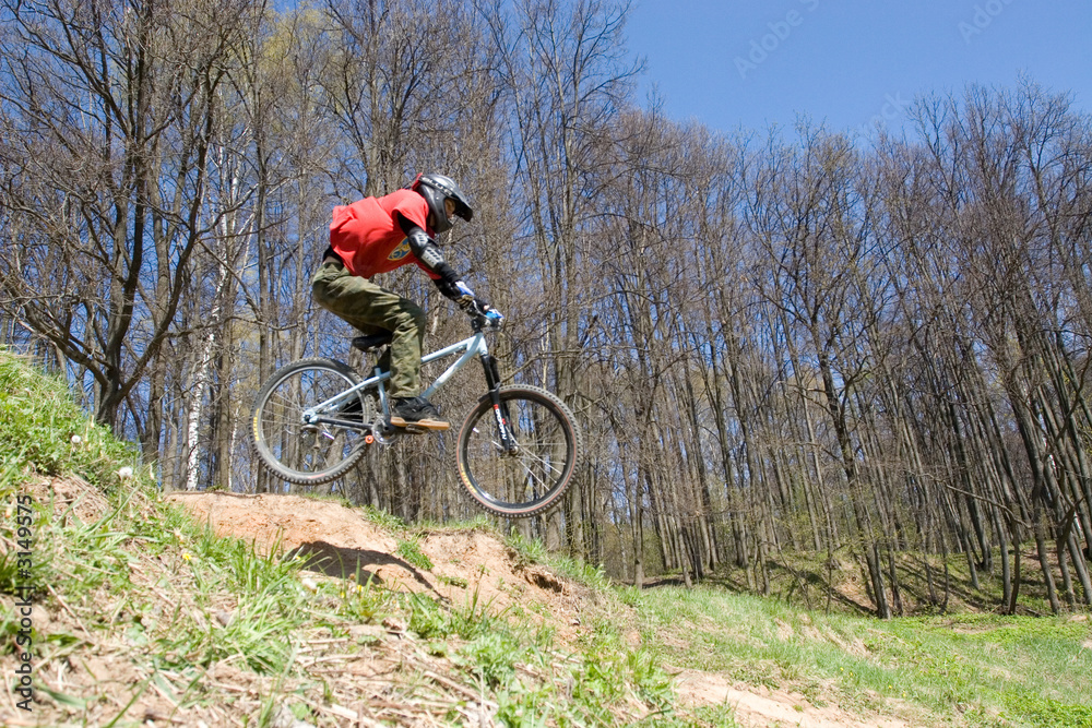 Fototapeta premium mountain biker in jump 2