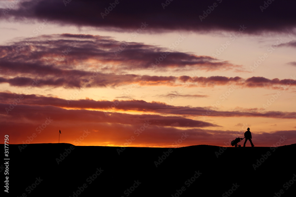 golfer at sunset