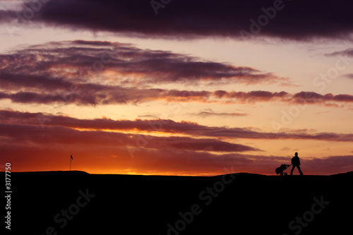 golfer at sunset © klikk