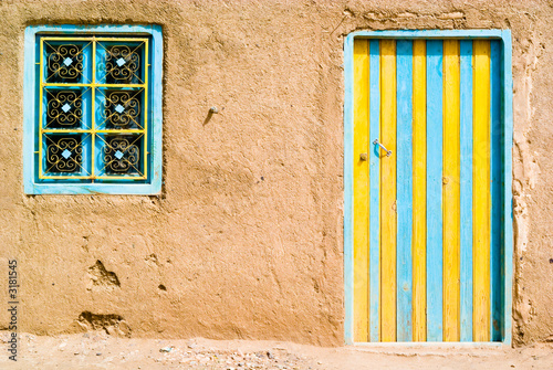 colored door in the desert, morocco
