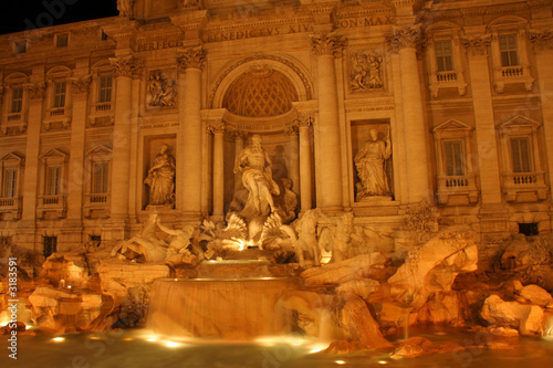 Trevi fountain at night photo