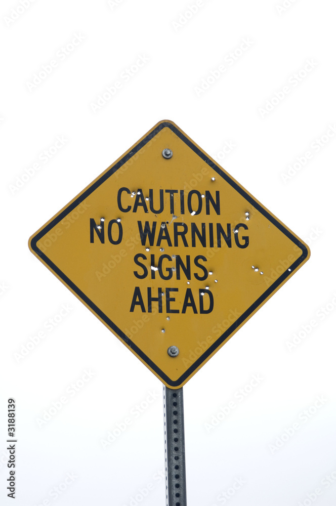 yellow caution sign with bullet holes yellow caution sign with bullet holes