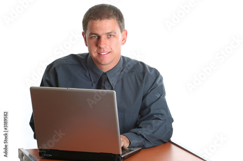 young male working on laptop