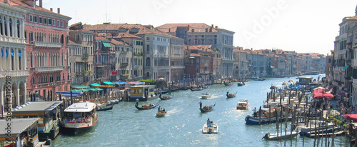 condolas and old houses on a the main water canal, venice, itali photo