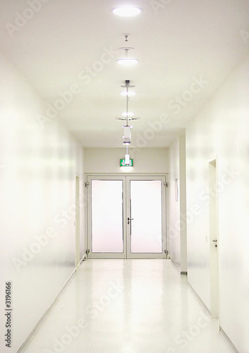 a meticulously clean white corridor